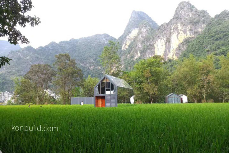A Chinese made prefabricated resort for Asia in place below majestic mountains.