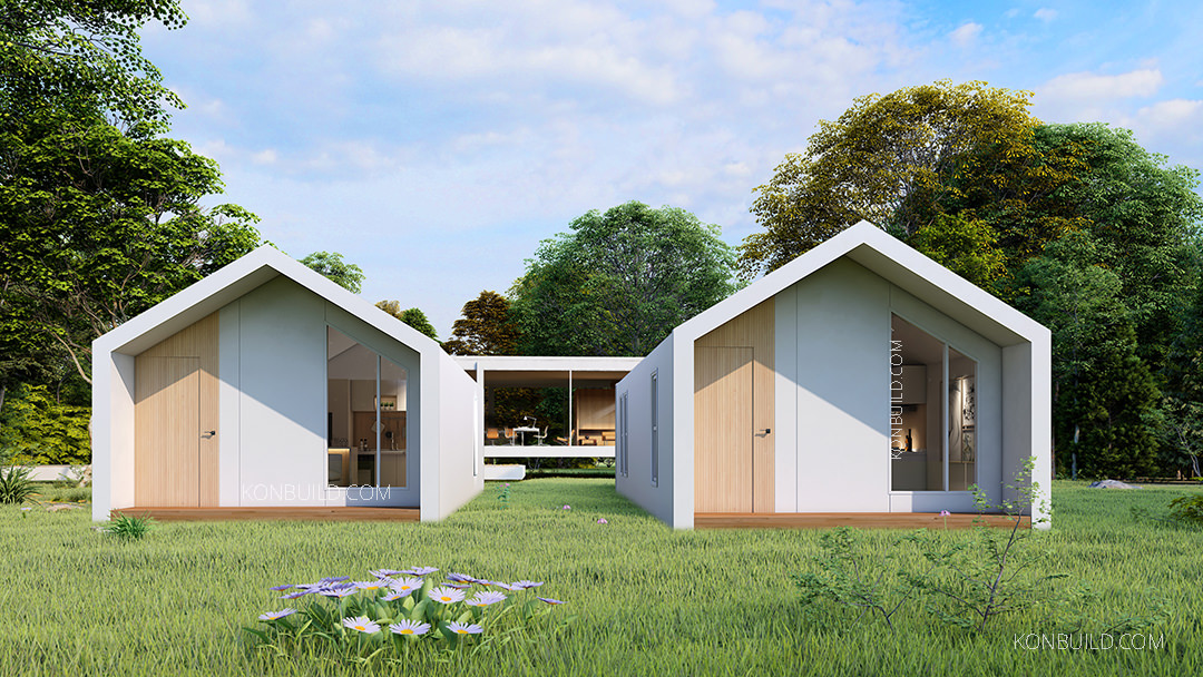 Two modern Modular Homes in a field. Bright and white with timber accents.